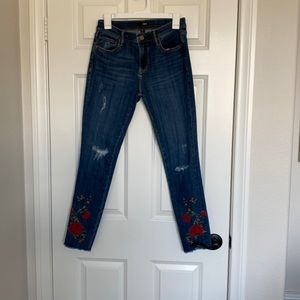 Aqua jeans size 27.  Embroidered detailing on bottom .  Distressed